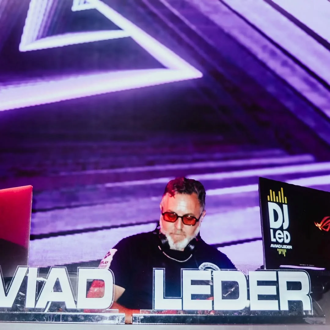 A video highlight featuring a vibrant DJ performance with rhythmic lighting and music.